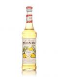 A bottle of Monin Poire (Pear) Syrup