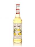A bottle of Monin Poire (Pear) Syrup