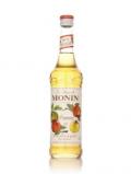 A bottle of Monin Pomme (Apple) Syrup