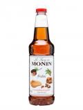 A bottle of Monin Praline Syrup
