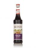 A bottle of Monin Th Cha (Cha Tea) Syrup