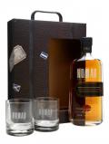 A bottle of Nomad Travel Box Gift Set with 2 glasses Blended Scotch Whisky