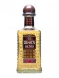 A bottle of Olmeca Altos Reposado Tequila