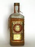 A bottle of Olmeca Tequila Añejo