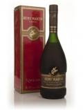A bottle of Remy Martin Fine Champagne Napoléon Cognac - early 1980s