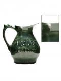 A bottle of Ardbeg / Light Green / Medium Jug / Chipped Spout