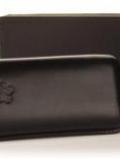 A bottle of Black Leather Cigar Case - Robusto
