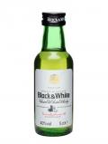 A bottle of Black& White Blended Scotch Whisky