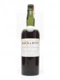 A bottle of Black& White / Bot.1940s / Spring Cap Blended Scotch Whisky