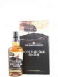 A bottle of Blended Scotch Famous Grouse Scottish Oak Finish