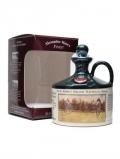 A bottle of Cecil Aldin's 12 Year Old Green Ceramic Blended Scotch Whisky