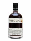 A bottle of Georgia Peach Liqueur / Leopold Bros