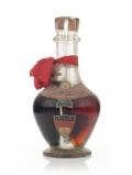 A bottle of Marie Brizard Four Compartment Liqueur Bottle - 1950s