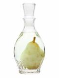 A bottle of Poire William (Pear) Eau de Vie / G. Miclo / Carafon