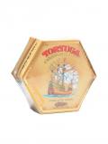 A bottle of Tortuga  Pineapple Rum Cake / 113g