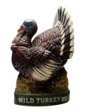 A bottle of Wild Turkey 8 Year Old Spread Tail Turkey / Empty Decanter