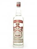 A bottle of Smirnoff Red (Antique)