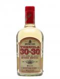 A bottle of Tequila 30-30 Reposado