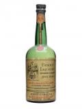 A bottle of Van Dulken White Curacao Liqueur / Bot.1940s