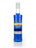 A bottle of Vedrenne Curaçao Bleu