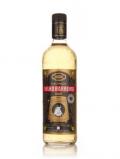 A bottle of Velho Barreiro Gold Cachaça