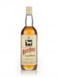 A bottle of White Horse Blended Scotch Whisky 70° Proof - 1970s