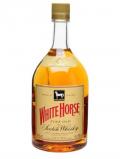 A bottle of White Horse Blended Whisky / Magnum Blended Scotch Whisky