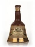 A bottle of Bell's Blended Scotch Whisky Bell Decanter - 1970s