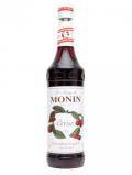 A bottle of Monin Cherry Syrup