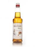 A bottle of Monin Crme Brle Syrup 1l