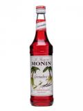 A bottle of Monin Grenadine Syrup