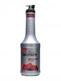 A bottle of Monin Red Berries Purée