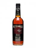 A bottle of Rittenhouse Straight Rye / 100 Proof Straight Rye Whiskey